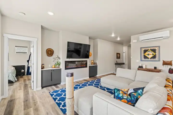 Electric fireplace for extra warmth in the winter, and a mini split for cooling in the summer!