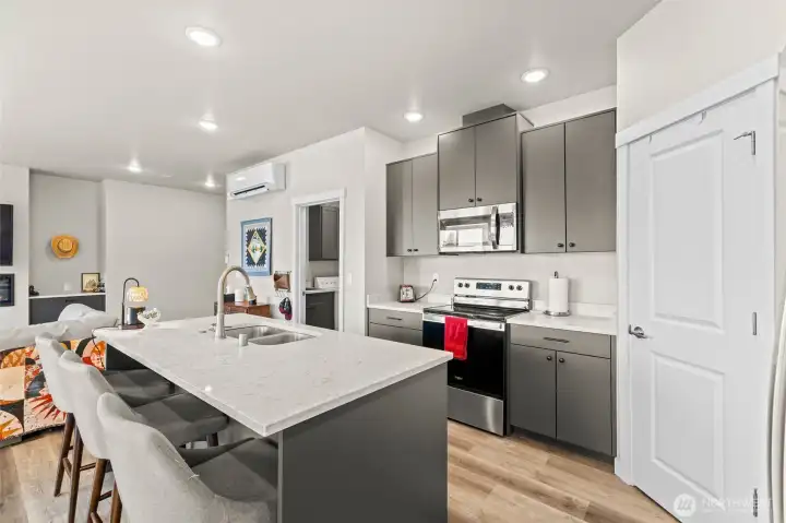 Bar seating at the kitchen island.