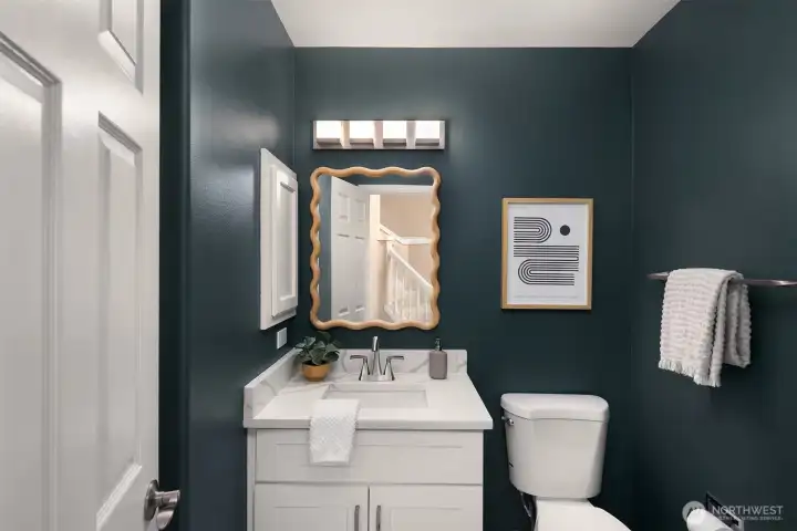 Main floor 3/4 bath with shower to the left Main floor 3/4 bath with shower to the left
