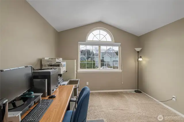 Bedroom 1 on upper level, currently used as office