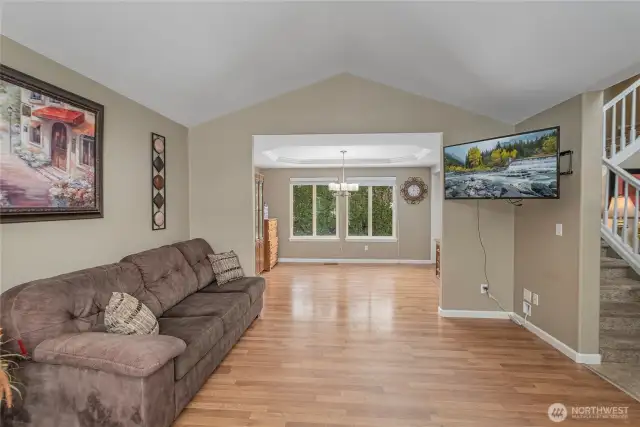 Large formal living room open to dining room off of entrance