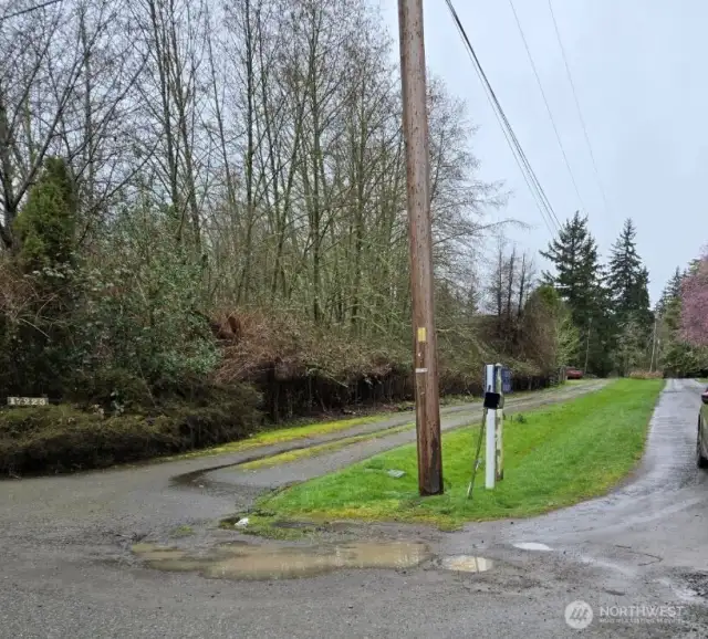 Take gravel Rd on the South Side to get to property