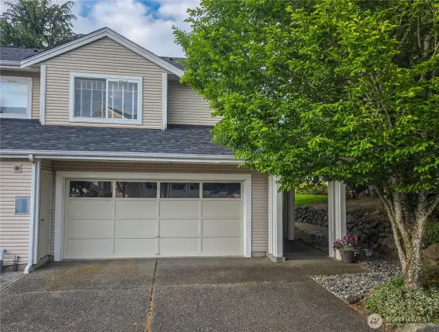 As you enter the driveway for The Links complex, going straight down the hill is #701 with attached 2 car garage and parking space for 2 cars in the unit's driveway.  There is guest parking just steps away and in various places throughout the complex.