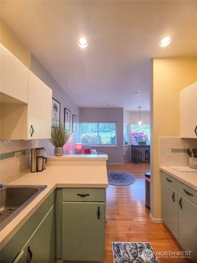 Looking from the dining room thru the kitchen to the flex room / casual dining space.