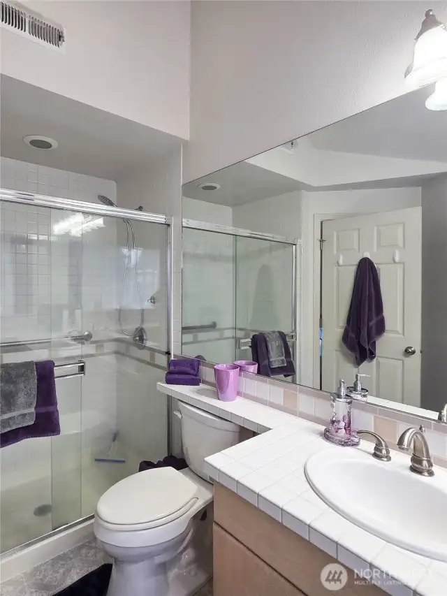 Large primary bathroom with shower.