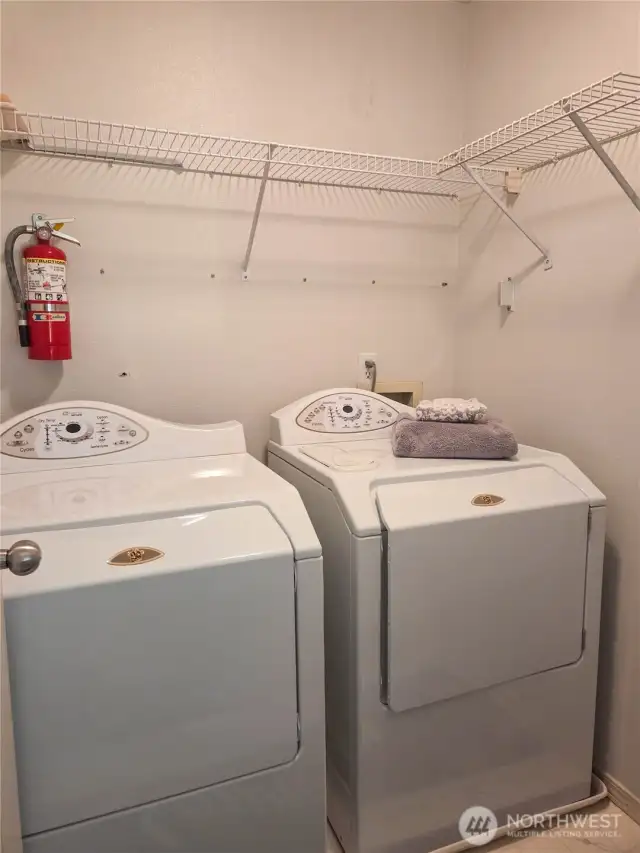 The laundry room is located upstairs in close proximity to all three bedrooms for convenience.