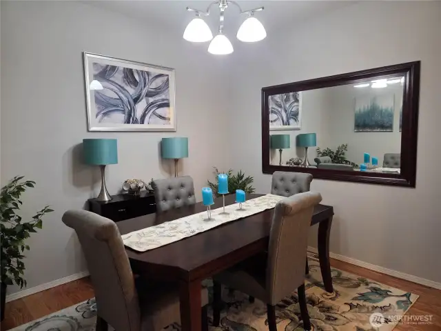 The formal dining room is just off the entry way and near the living room and kitchen.