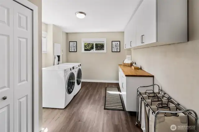 Large laundry room in basement (could be a large 4th bedroom).