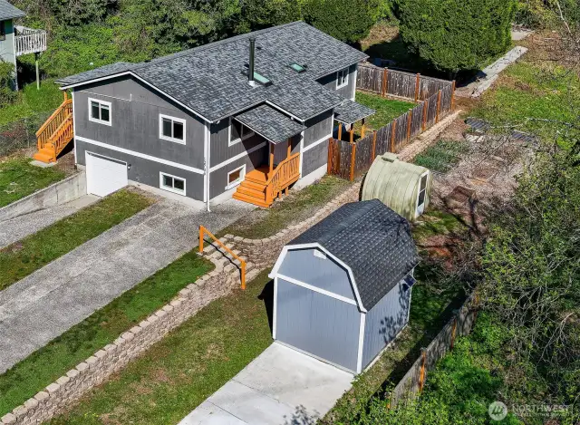 Outbuilding provides extra storage.
