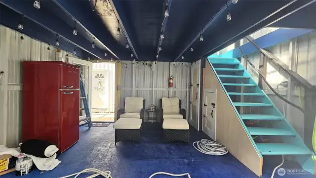 Remodeled in 2024 w all new staircase, loft structure, flooring, dock edge bumpers, new curtain and opener