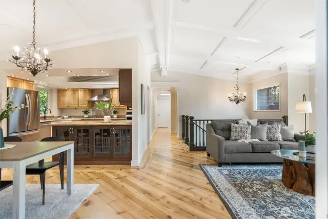 Light-filled spaces fill the open floor plan.  Newly refinished knotty pine and oak floors.
