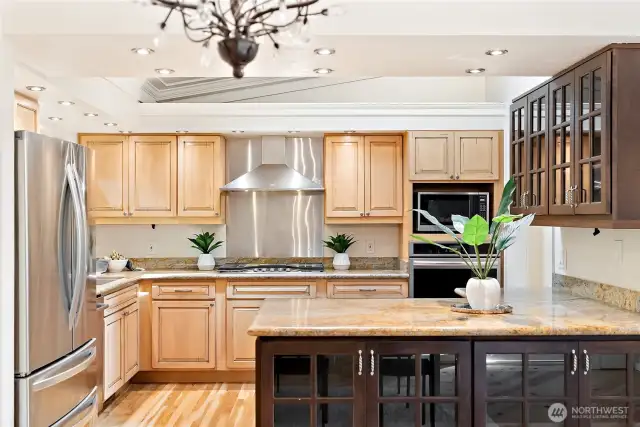Updated chef's kitchen with beautiful granite countertops, stainless steel appliances and a 5-burner gas stove.