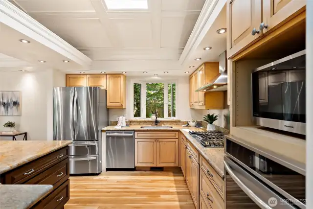 Enjoy the tranquility of the outdoors through the garden window!  Kitchen skylight lets it natural light and also opens up!