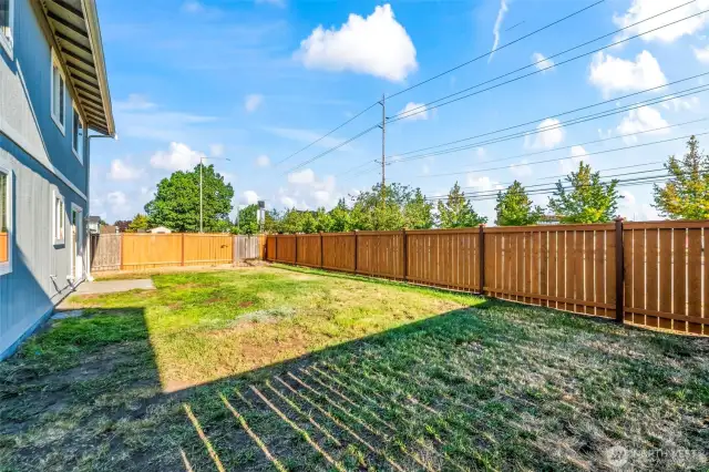 Large backyard for playtime, barbecues, and gardening.