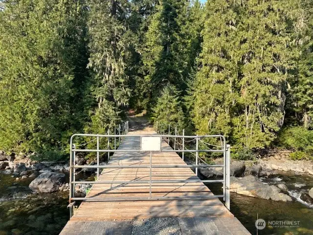 The bridge over the Cle Elum river that leads to the lot.
