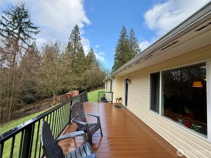 Front deck looking towards backyard, acreage with chicken area and fenced on pens