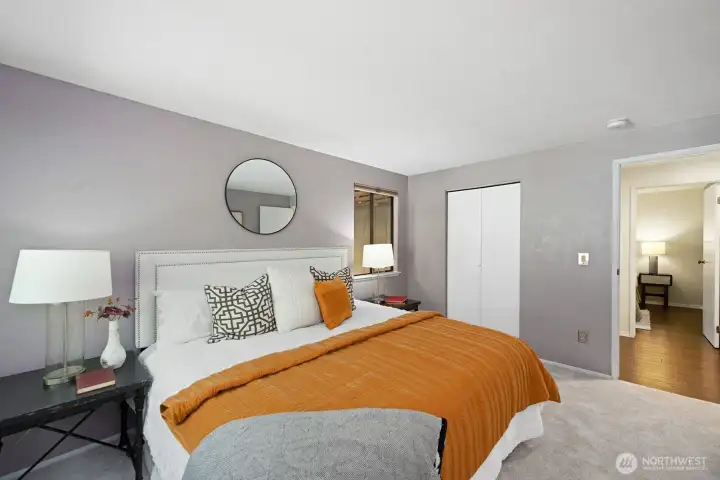 Primary suite easily accommodates a king bed.