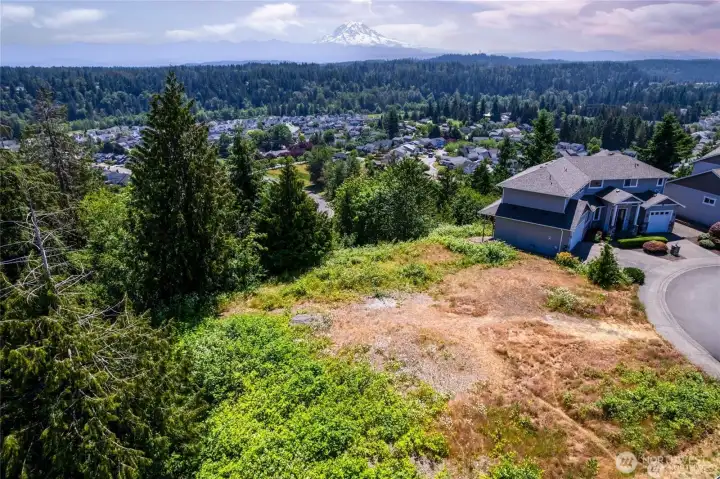 Imagine waking to this view each day! Perched at Bonney Lake’s highest elevation, this premier homesite offers sweeping, unobstructed views from Mount Rainier to the Olympic Mountains.