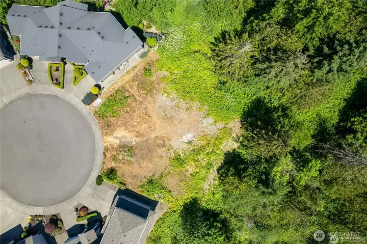This exceptional homesite offers unmatched panoramic vistas—stretching from the majesty of Mount Rainier to the glimmering lights of the city below. Positioned on one of the community’s most desirable points, it’s a rare opportunity to build your dream home in a setting that feels both elevated and exclusive.