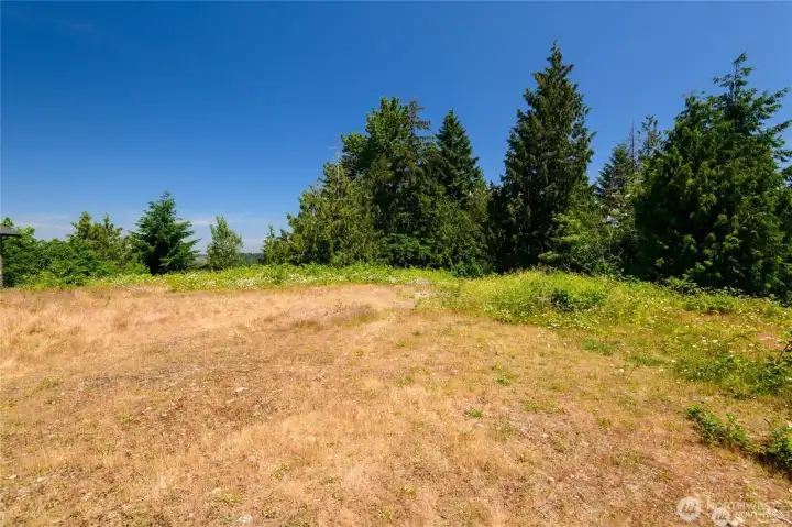 This serene homesite offers more than just a place to build—it provides a quiet retreat surrounded by nature. Water and gas are in the street and electricity is already on the property.