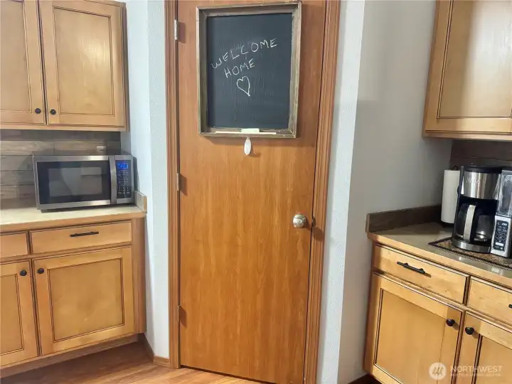 Right next to the kitchen is the walk-in pantry. It's got lots of storage, and is vey convenient for all cooking needs.