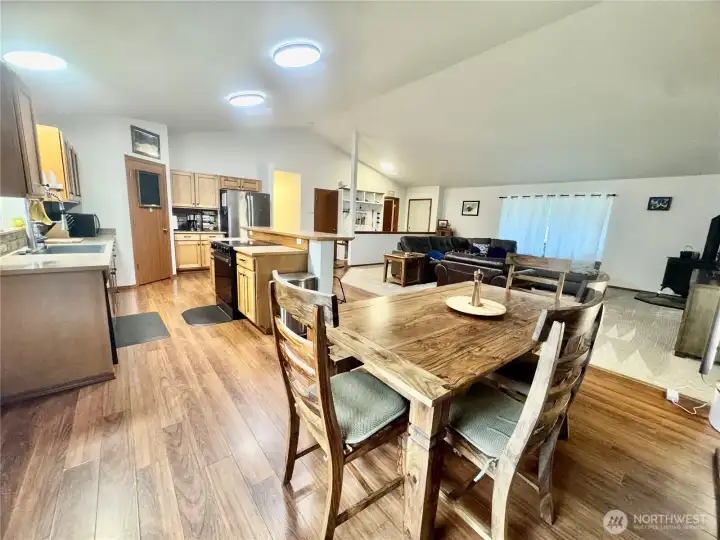 The kitchen, dining and living rooms.