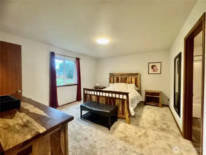 The primary bedroom suite includes a walk-in closet, and the primary bathroom.