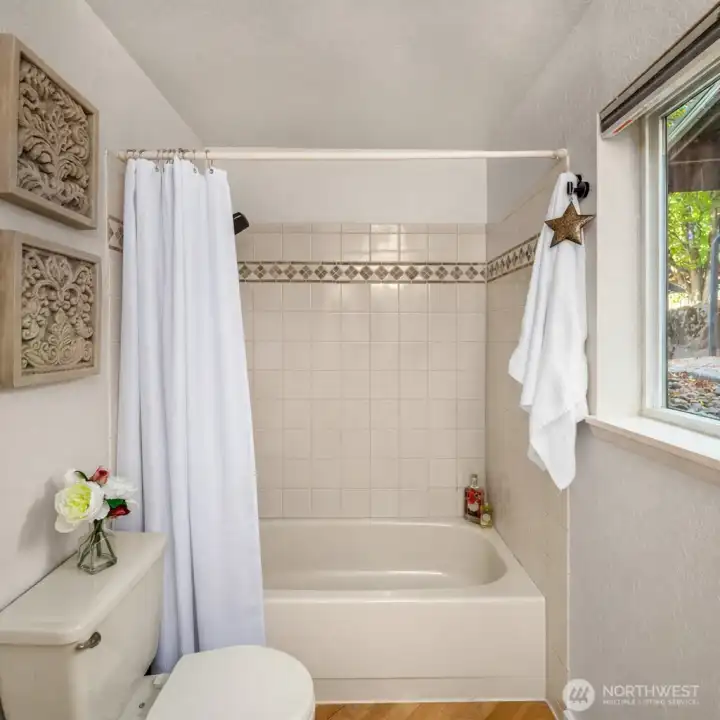 Tiled and flows with natural light.