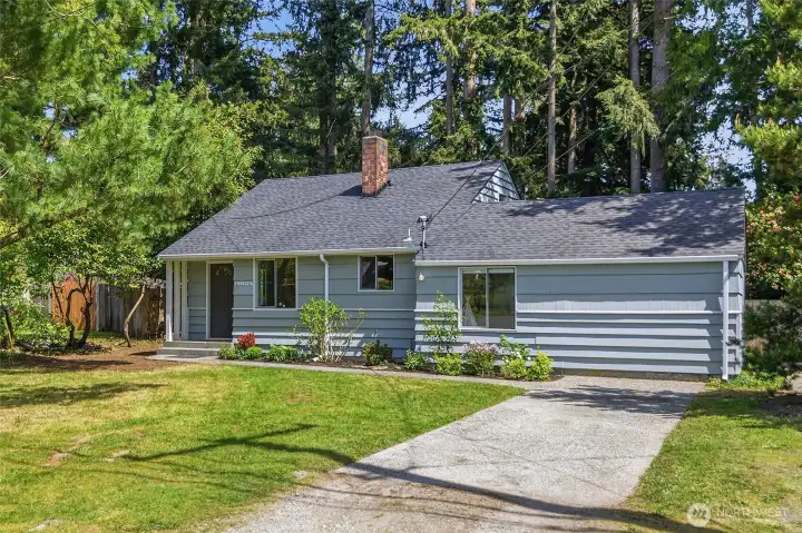 Front view of this updated and well care for Lovell built mid century home.