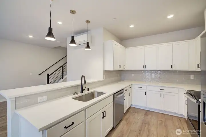 Tons of work space and storage in this cook's friendly kitchen!