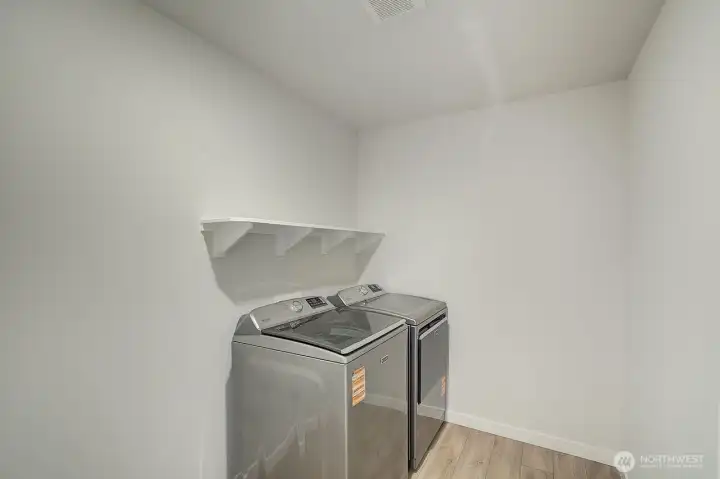 Convenient upstairs laundry...extra storage