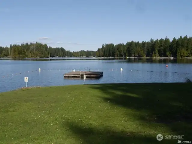Swimming area with floating dock.