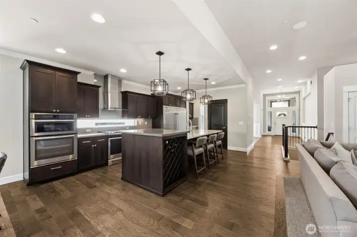 Built in wine rack, gas stove, and professional fridge are ready for any gourmet chef