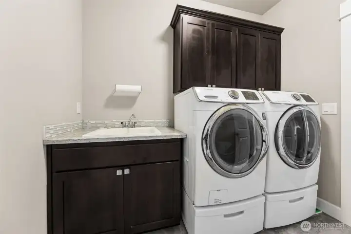 Main floor utility room with garage access
