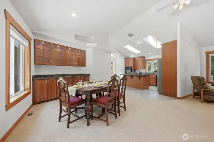Dining area with built in cabinets and counterspace.