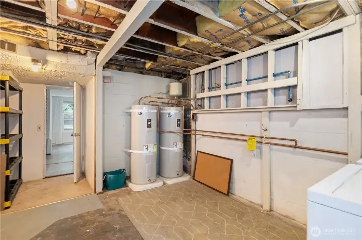 shared laundry showing door to Unit B