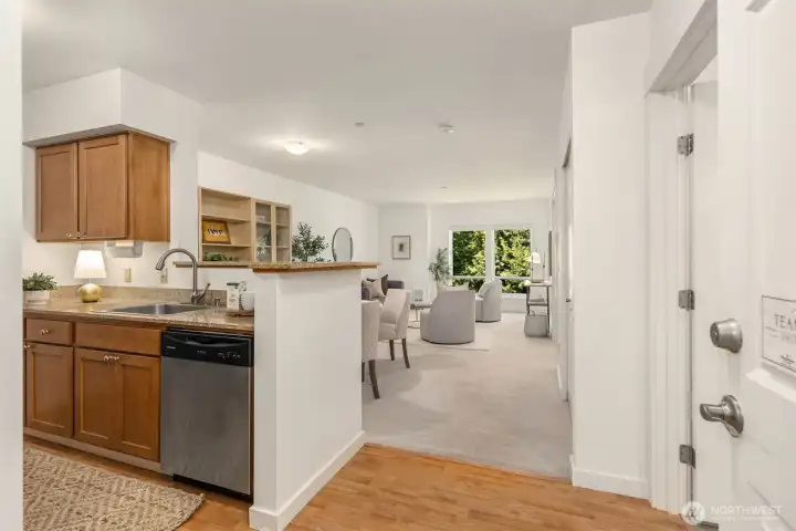 From the entry of your home, is the open kitchen and views of the living/dining and treetops. From the entry of your home, is the open kitchen and views of the living/dining and treetops.