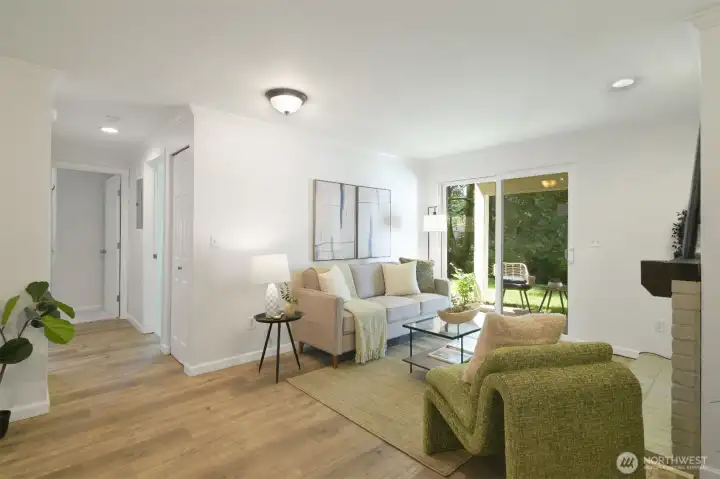 New laminate flooring throughout main living area.