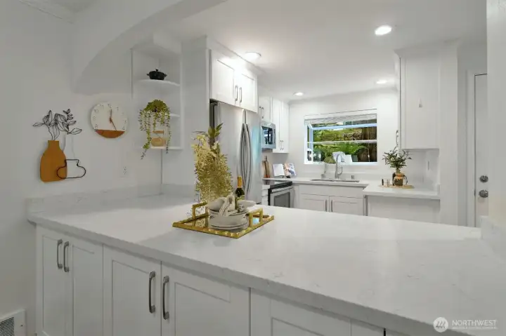 The open-concept kitchen ensures you are always part of the conversation while entertaining.