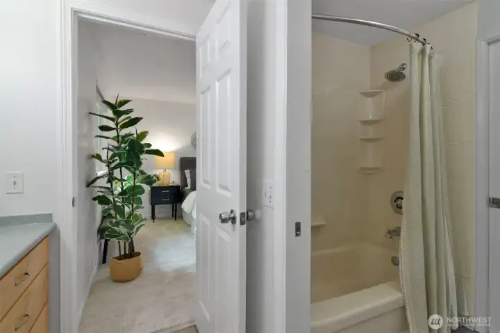 Convenient layout, allowing you to shower in private while your partner gets ready in the separate bathroom area.