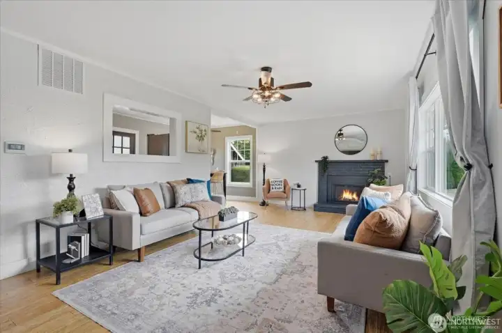 Light-filled living room with gas fireplace