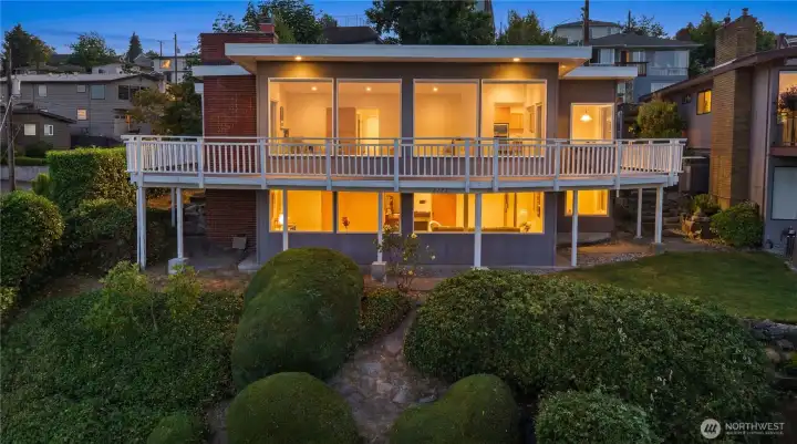 Welcome to this well-maintained home with 2210 sqft of living space featuring a wall of windows showcasing  spectacular views.