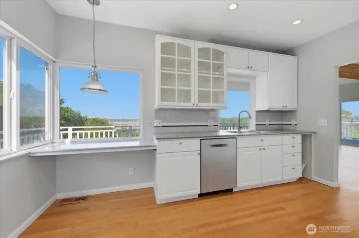 A light and bright kitchen with airy views right out your window.