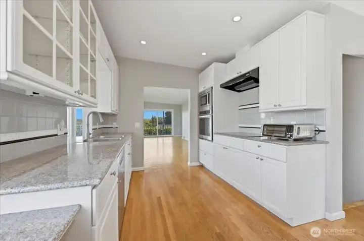 This galley style kitchen is sure to please the chef in the house with everything you need at your fingertips.