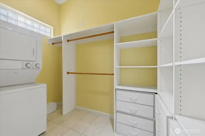 Large walk-in closet serves a dual purpose with convenient stackable washer and dryer, no more dragging laundry around!