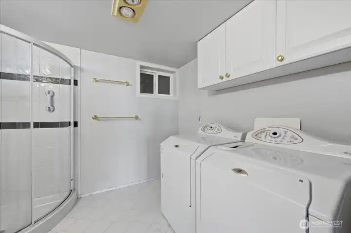 This efficient three-quarter bath and laundry room combination maximizes functionality without sacrificing convenience.