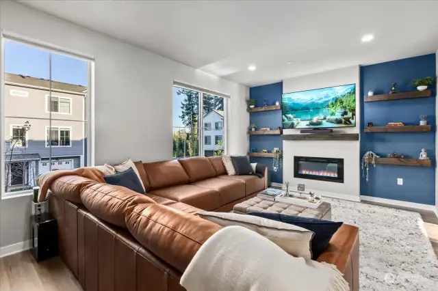 Living Room w/ TV & Custom Shelving