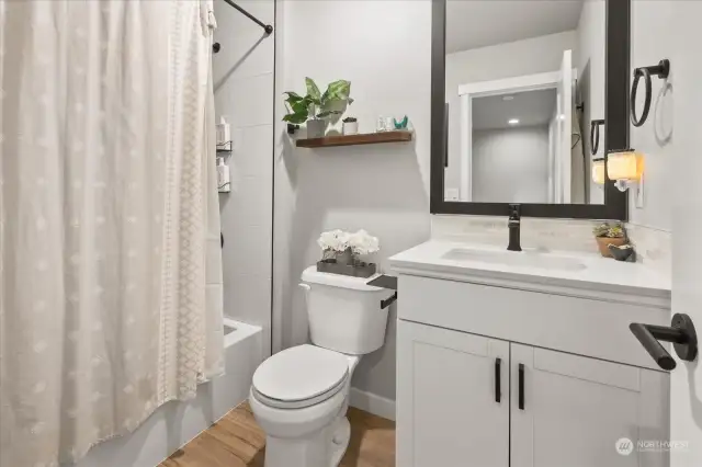 Bathroom 2 with Upgraded flooring and Tile Shower