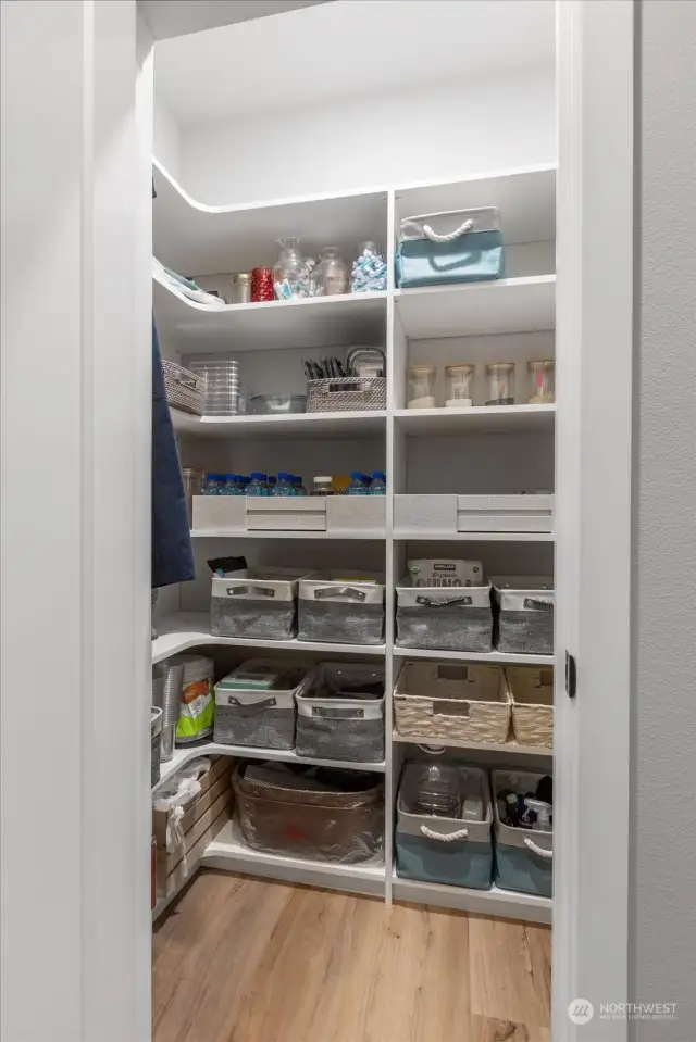 Pantry w/ Custom Shelving to maximize space.