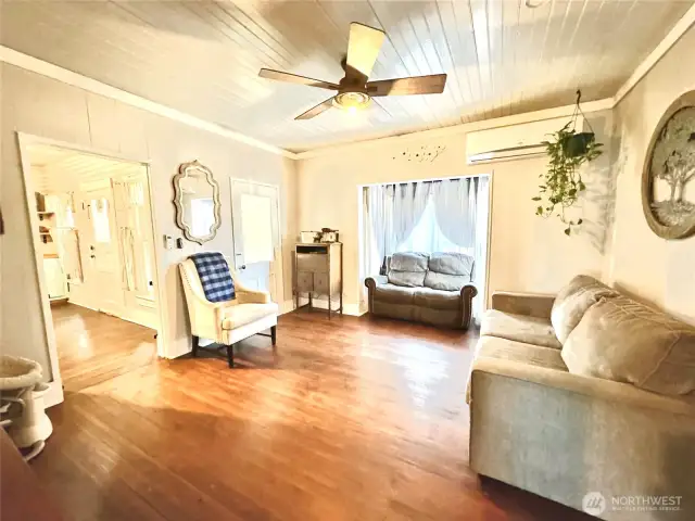 Living Room off kitchen with additional door to screened in porch